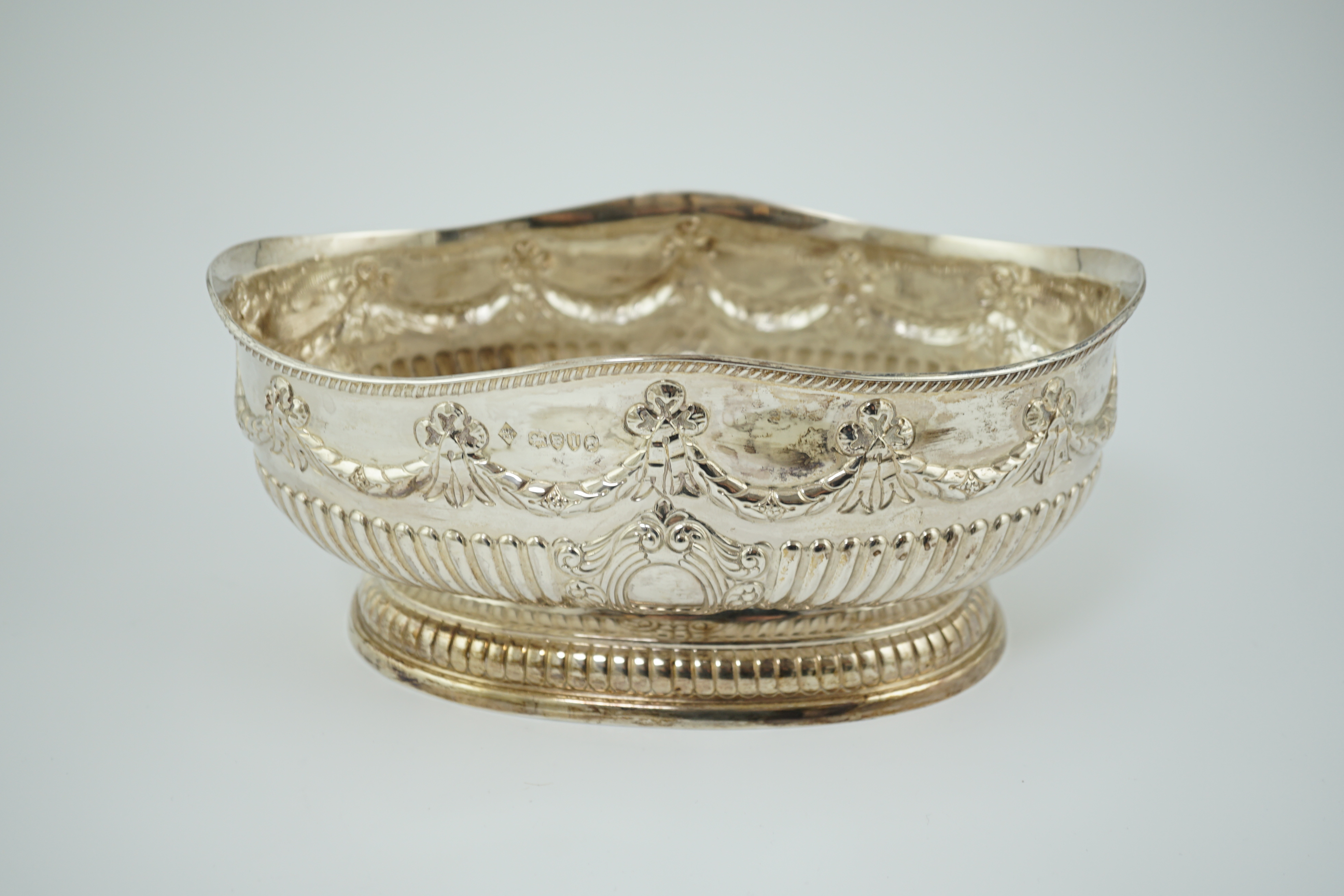 A late Victorian demi-fluted silver oval fruit bowl, by Martin, Hall & Co